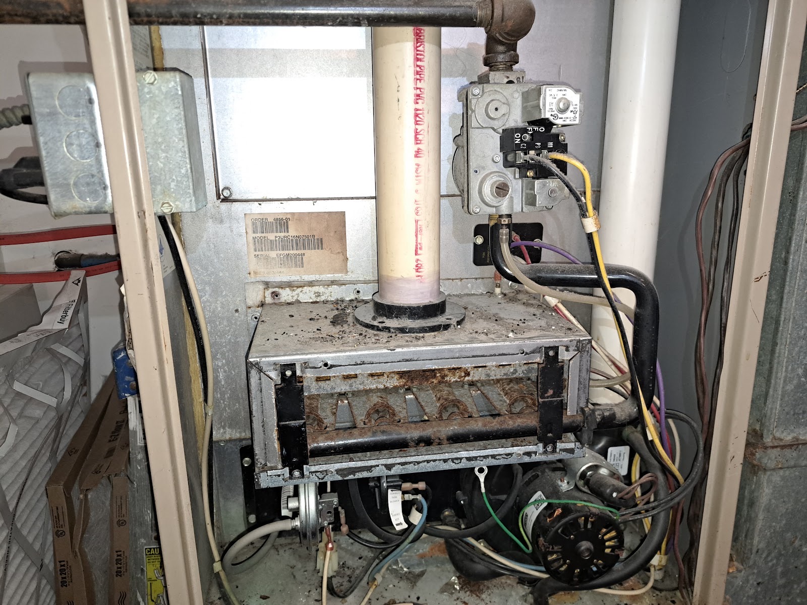 Gas furnace with its service panel removed
